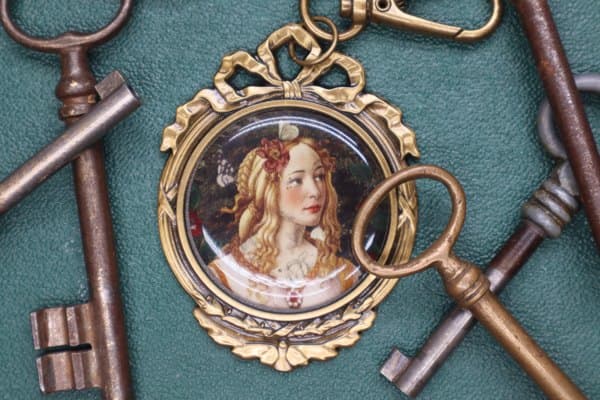 Porte-clefs médaillon · EXTASE